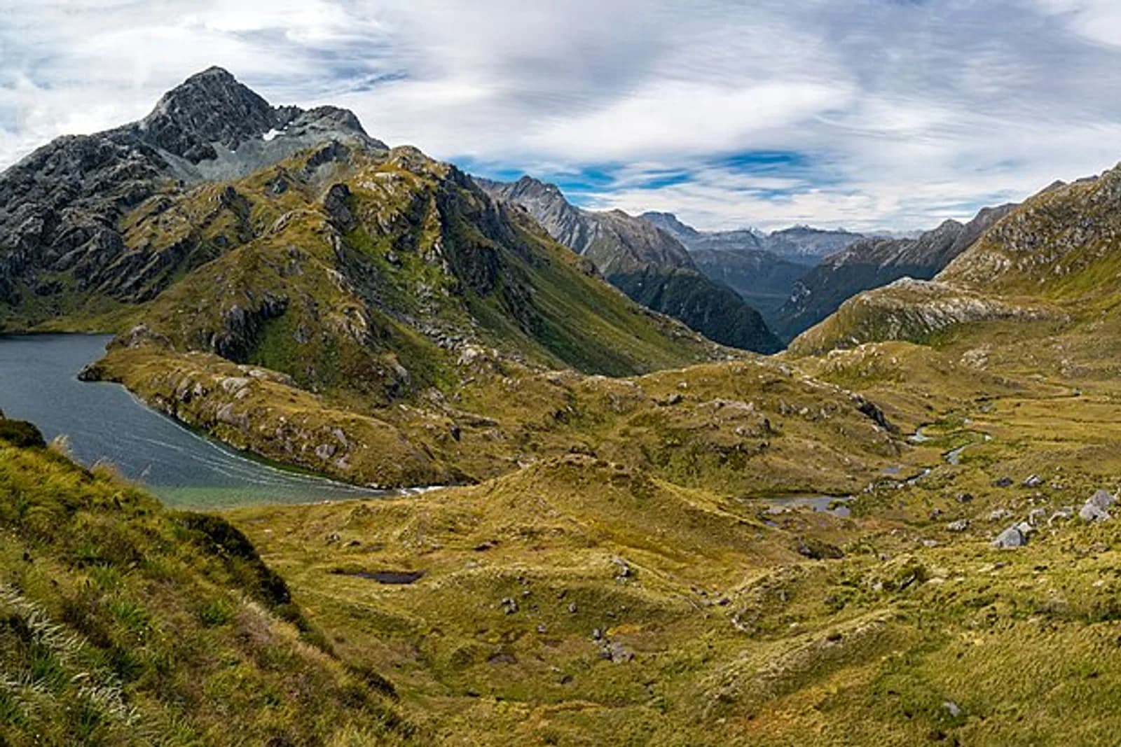 500px provided description: Another sweeping panorama from the Routeburn Track, steps away from the Harris shelter. One heck of a hike! [#new zealand ,#hiking ,#routeburn track ,#routeburn ,#harris saddle]